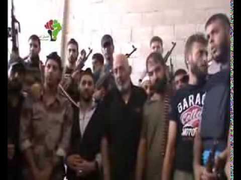 لقاء مع العقيد محمد الدهني قائد فرقة 18 أذار للحديث عن أهمية حاجز المؤسسة في ساحة بصرى