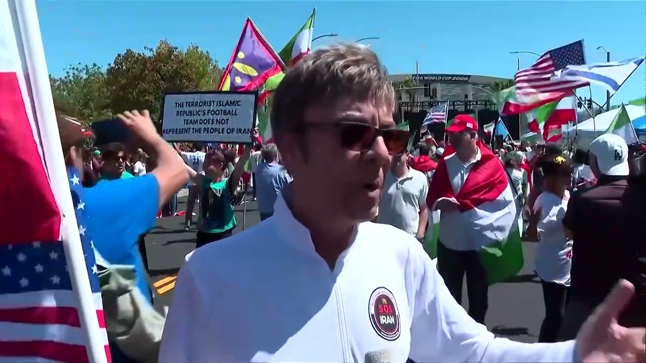 Video | Hundreds protest at stadium ahead of Iran's World Cup opener