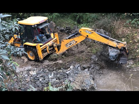 JCB Backhoe Loader Breaking Concrete Wall In River @droneplanet2040
