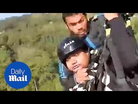 Hero pilot saves man after their paraglider SNAPS mid air