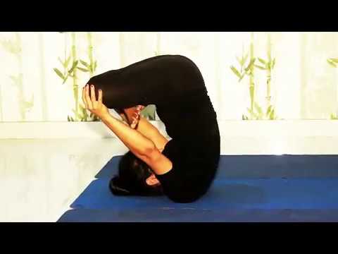 how to do Padma sarvangasana, or lotus shoulderstand pose