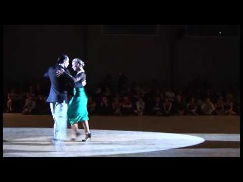  Rodrigo Rufino  and  Gisela Passi  are  dancing  to  "  Vuelvo al Sur  "  at  Tango Festival St Geniez  in  2013