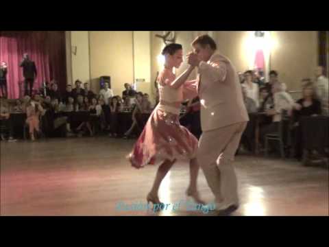  Julio Balmaceda  and  Virginia Vasconi  are  dancing  to  the  tango  "  Romance de Barrio  "