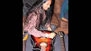 Anand Bhatt Signs Guitars for Autism Speaks