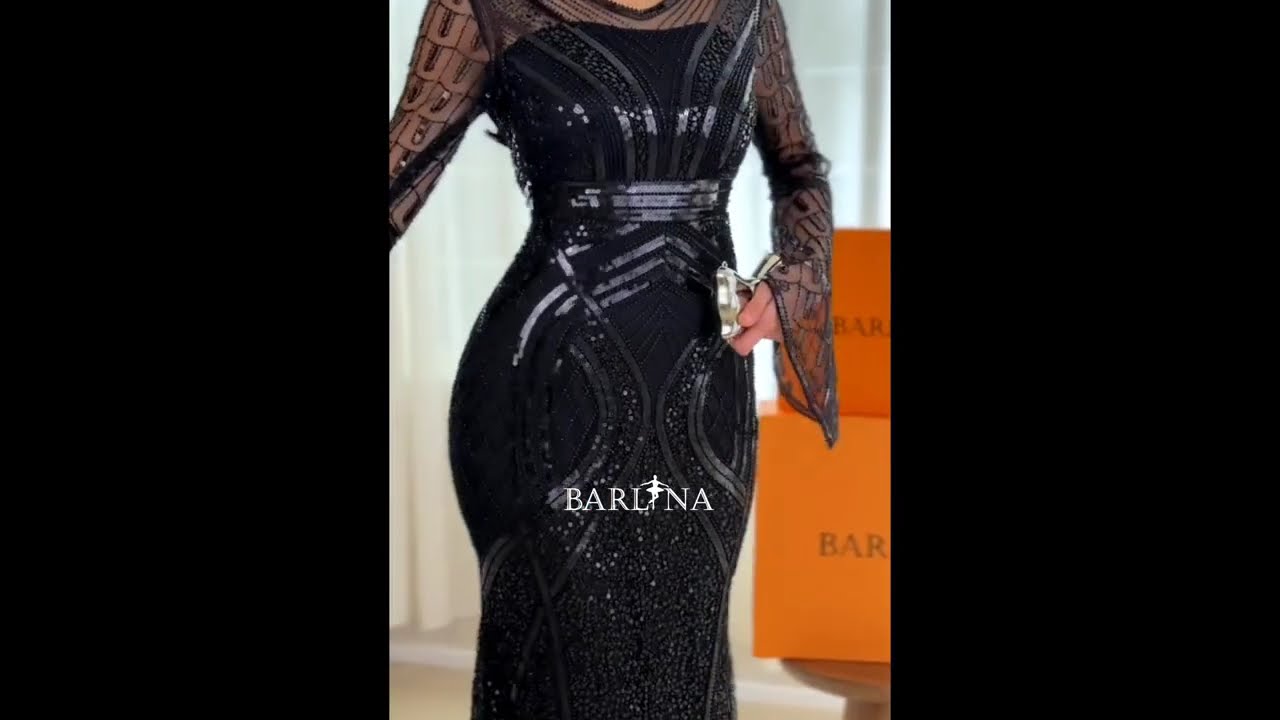 فستان سهرة أسود بأكمام واسعة شفافة - L