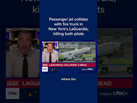 Passenger jet collides with fire truck in New York's LaGuardia, killing both pilots