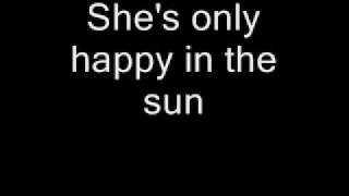 Ben Harper - She's Only Happy In The Sun lyrics