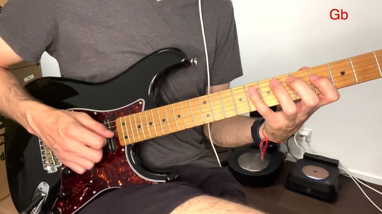 Guitarist demonstrating seventh intervals moving through the circle of fourths on the fretboard