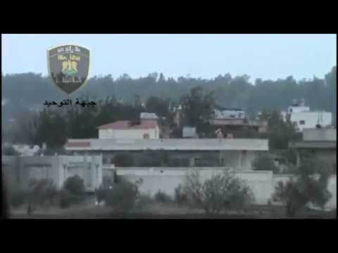 استهداف حاجز لقوات النظام بمدفع 82 من قبل جبهة التوحيد في مدينة الرستن في محافظة حمص