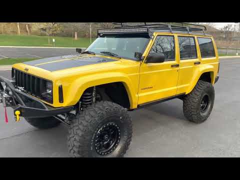 Sold: Heavily-Modified Solar Yellow 2000 Jeep Cherokee XJ