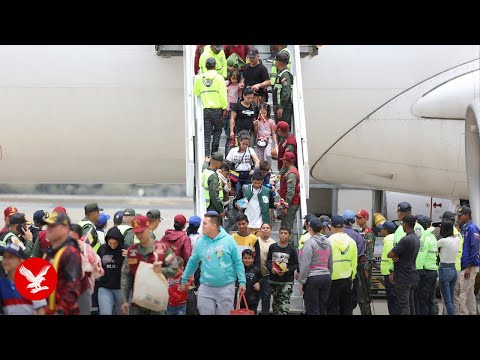 Live: Venezuelan migrants deported by the US arrive in Caracas