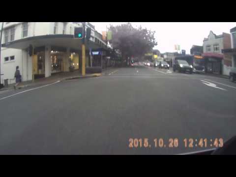 Scooter running red lights in Remuera