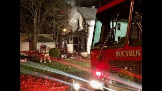 Crews battle injury-causing blaze.