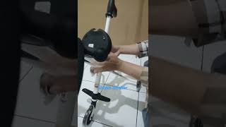 cara melipat stroller roda tiga PMB EZZY S-05