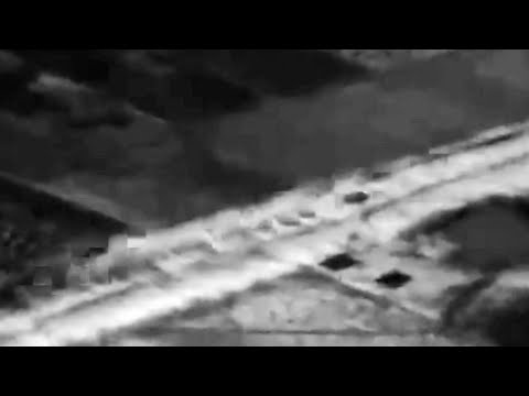 F-16 low pass over a car as a show of force