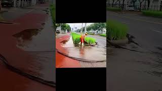 The process of cleaning workers cleaning up stagnant water