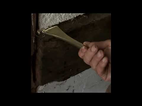 Oakum Caulking old timber frames to make them watertight