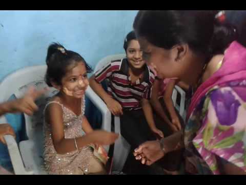 Bhumika Chandel Birthday spading cake on mumma's face