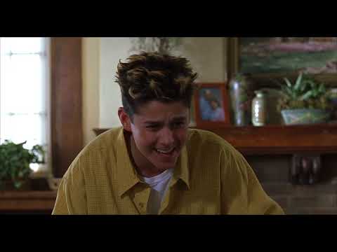 Official trailer still from Disney’s The Country Bears (2002) with Beary Barrington gazing at the Country Bear Hall poster