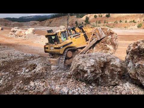 Caterpillar D8T Bulldozer Pushing Huge Rocks
