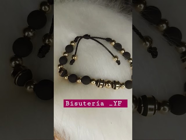 Vídeo relacionado con BDM Pulsera de hombre y mujer de tela negra con notas musicales. Pulsera musical, ajustable a distintas medidas.