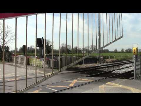 Blakestown Level Crossing HD-Irish Rail Level Crossing gates closing.