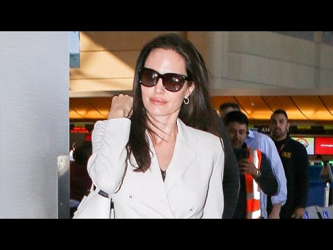 , title : 'Angelina Jolie And Her Kids Jet Out Of Town'