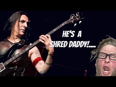 Is Joey DeMaio of Manowar playing a Guitar Solo on a Bass?