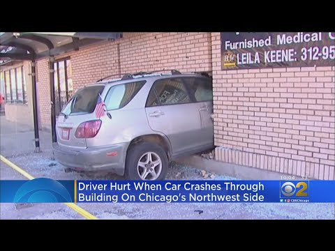 Driver Hurt When Car Crashes Through Building On Northwest Side