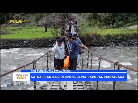 SATGAS OPS DAMAI CARTENZ DAN TNI EVAKUASI JENAZAH TUKANG OJEK KORBAN PEMBACOKAN OTK DI PUNCAK JAYA