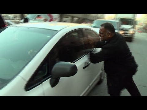 Caught on camera: Taxi driver confronts Uber driver