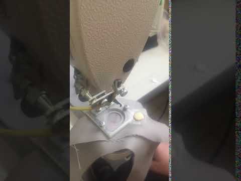 Automated solution for sewing on a laser-marked magnet video