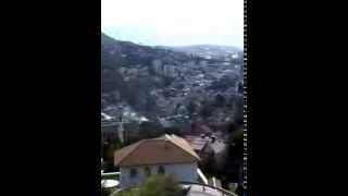 preview picture of video 'Bosnia and Herzegovina, Sarajevo, view to the city from south-east suburbs'