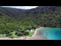 Take a look at the Captain Cook memorial, fly around the beach on the shore, see a yacht anchored up in the alcove of the bay and get a feel for the start of the Queen Charlotte track.