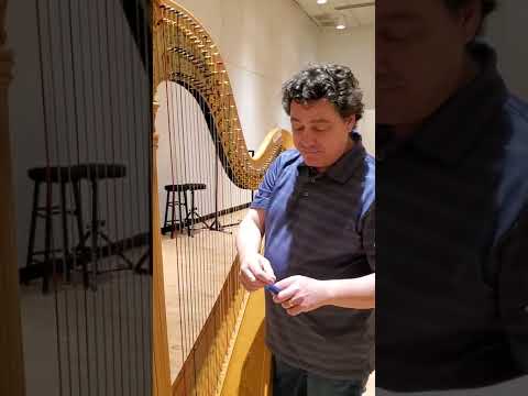 Pedal harp bass wire nut buzz fix with cardboard