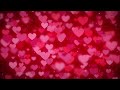 4K Abstract gradient background with red hearts shape flowing - infinite loop Valentine's day