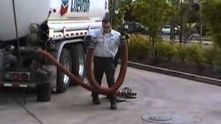 Download the video "Delivering Fuel at a gas station"