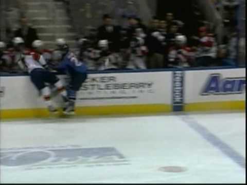 Jim Slater hits Dmitry Kulikov