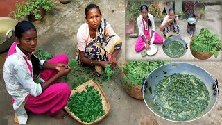 Cooking Moringa Leaves And Lentils — Grandma And Granddaughter