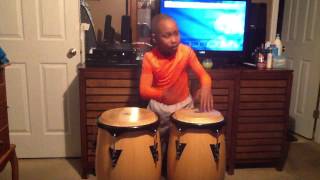 GO-GO LIL C - Amazing 8 year old Go-Go Conga player