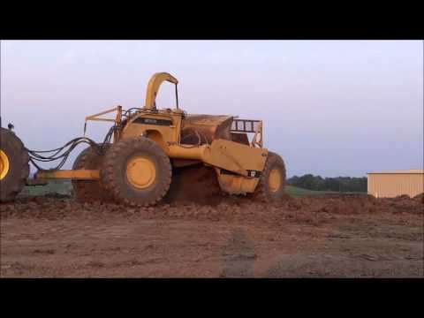 Unloading CAT 621 scrapers for building pad plus pics of final pad - part 3