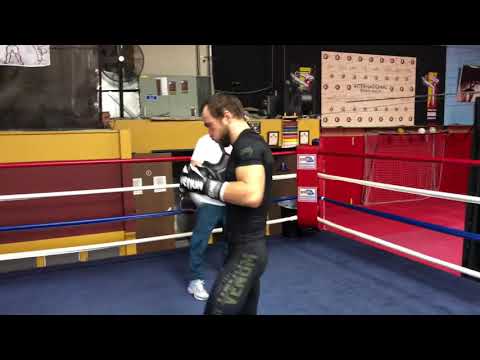 Top Rank 147 Star Alex Besputin Working With Coach Roma On The Mitts