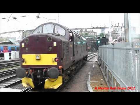 WCRC Class 37516 Thrahses out of Kings  Cross working a shunting move.