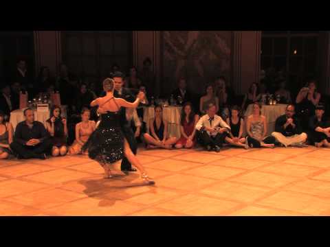  Mariana Montes  and  Sebastian Arce  are  dancing  to  the  tango  "  Esta Noche De Luna  "  by  Osvaldo Pugliese  at  TangoAmadeus  in  2013