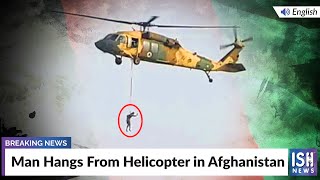 Man Hangs From Helicopter in Afghanistan