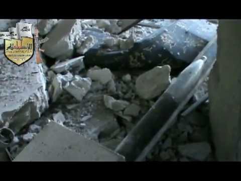 استهداف لواء الإسلام بصاروخ محلي الصنع مبنى الإنشاءات العسكرية في حي برزة في مدينة دمشق