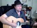 Little town square. Performed by Richard Mendonca. Written by Junior Brown