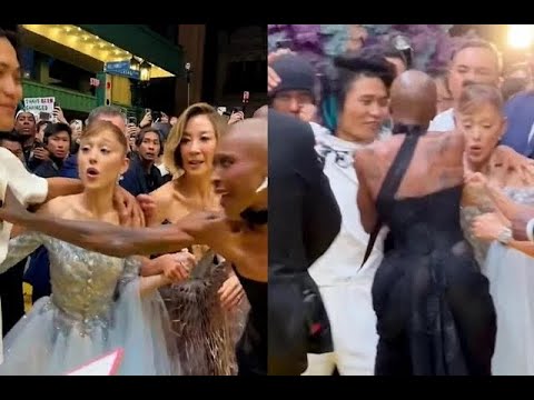 Ariana Grande's Fan Invasion: A Close Call on the Red Carpet
