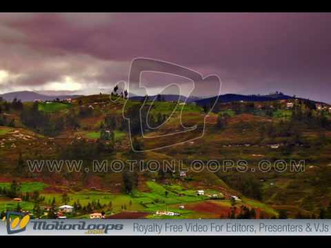 A Foggy Ecuador morning  with dark clouds over hills movie clip.