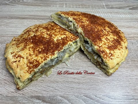 Pizza siciliana. Focaccia a tre strati con acciughe e maggiorana. Ricetta facile.